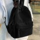 ファッションウィメンズバックパック、コーデュロイのソリッドカラー、おしゃれな学生用リュック、ブラックのナイロン素材、調節可能なショルダーストラップ、ジッパーデザイン、ポリエステル裏地